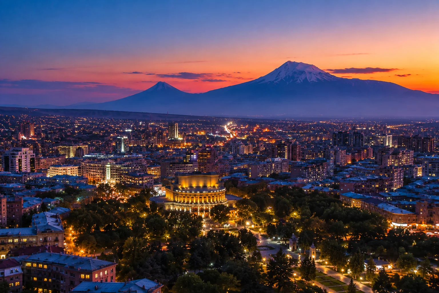 Panoramic evening view of Yerevan with Opera House and Mount Ararat