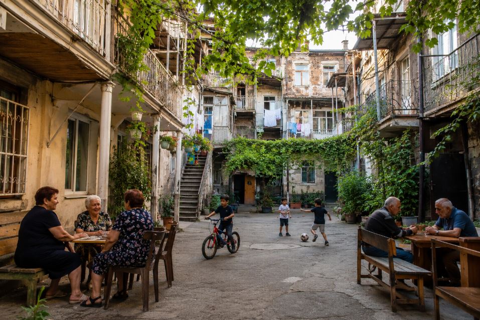 Traditional courtyard life in Yerevan showing authentic Armenian community lifestyle