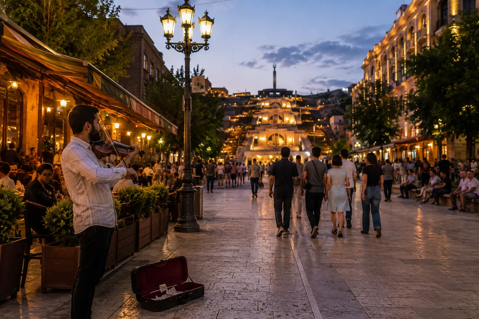 Street musician performing near the Cascade during an evening walk in Yerevan